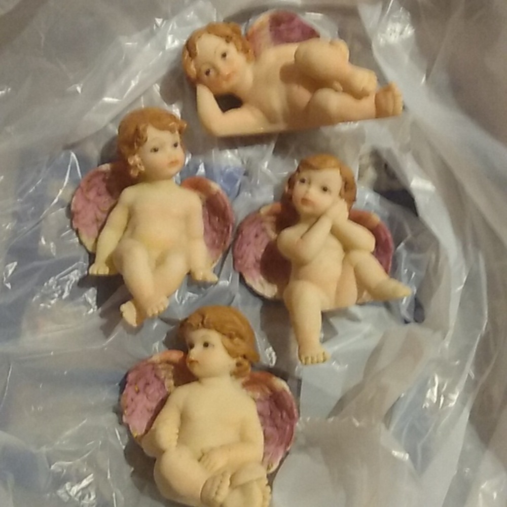 Vintage shelf sitter angel set. Hand painted set of 4.